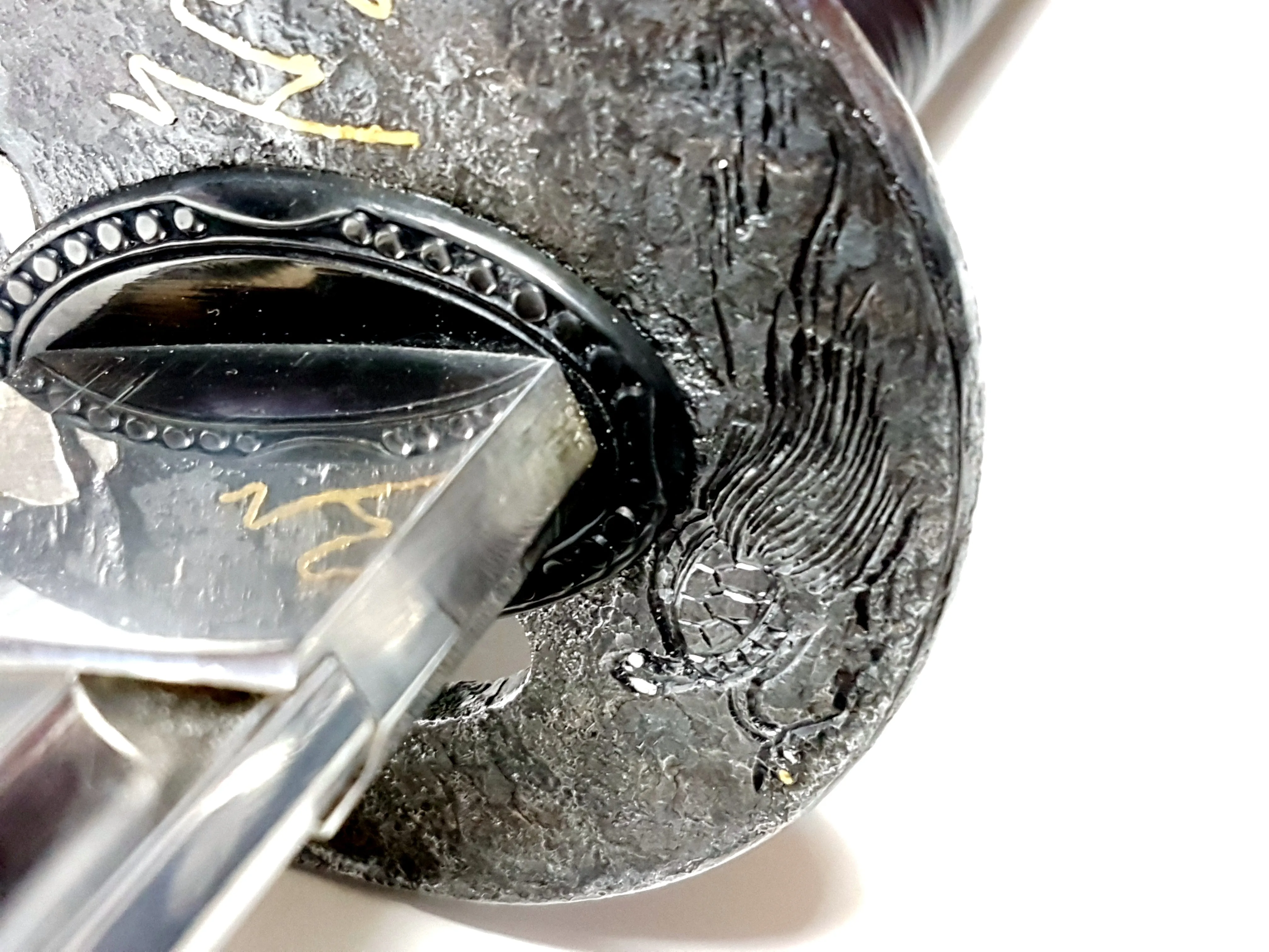 Turtle-themed katana with hand carved iron tsuba