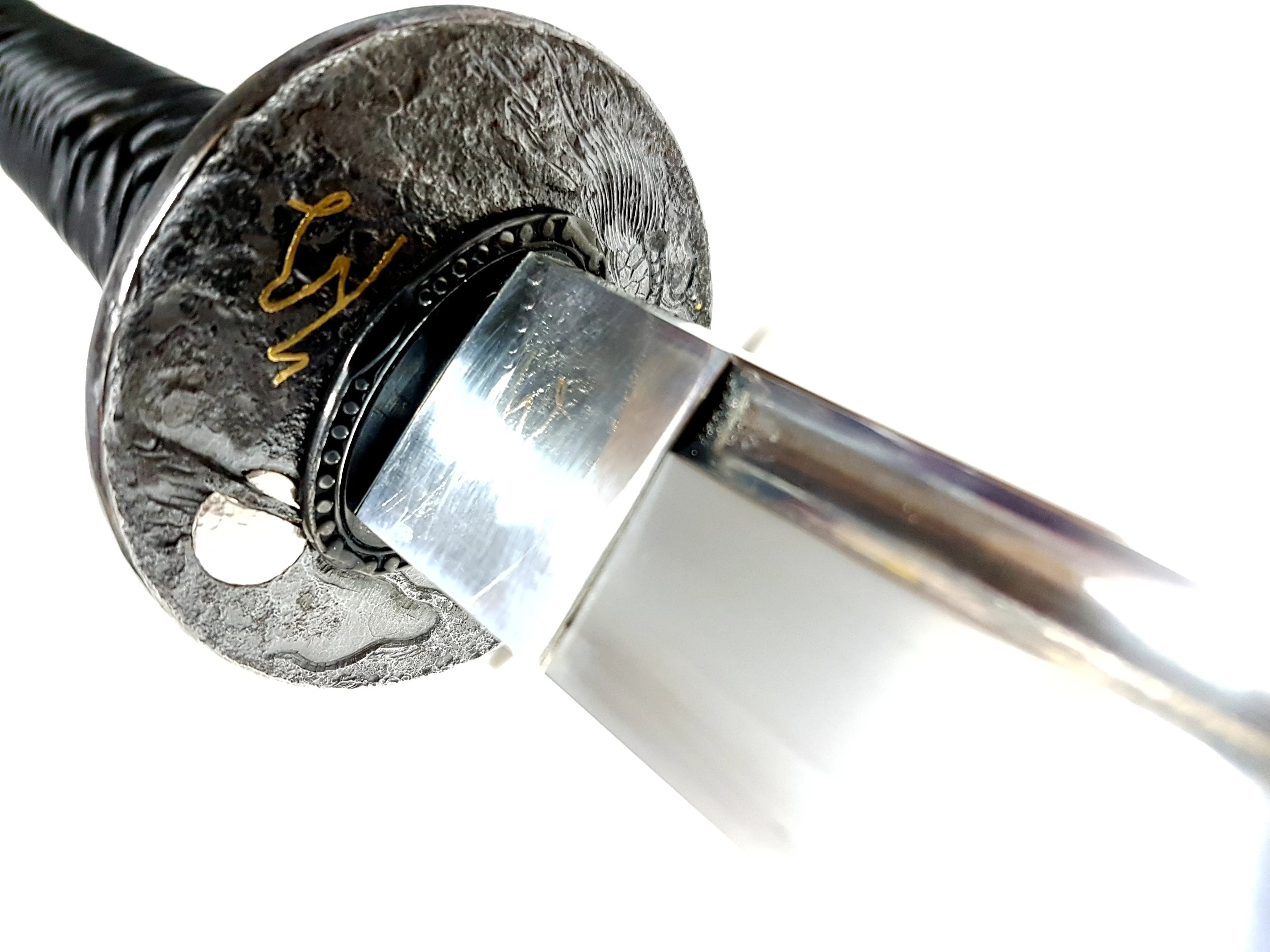 Turtle-themed katana with hand carved iron tsuba