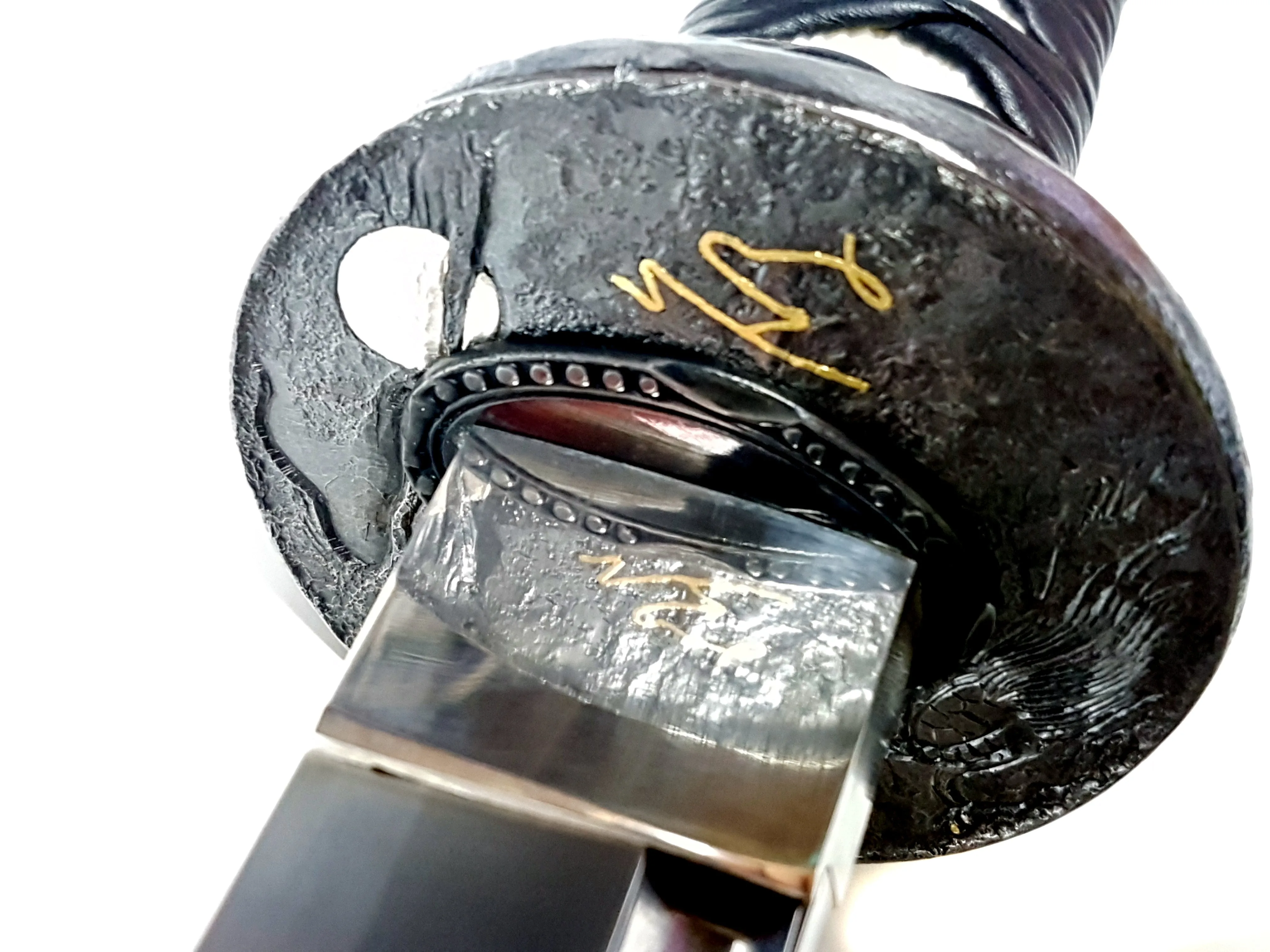 Turtle-themed katana with hand carved iron tsuba